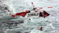 Helicopter over ocean