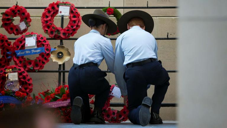 Australian Air Force Cadets lay a wreath during a Last Post service at the Menin Gate Memorial