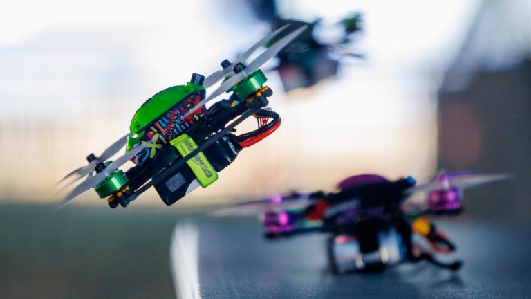 Image of two drones flying in the air
